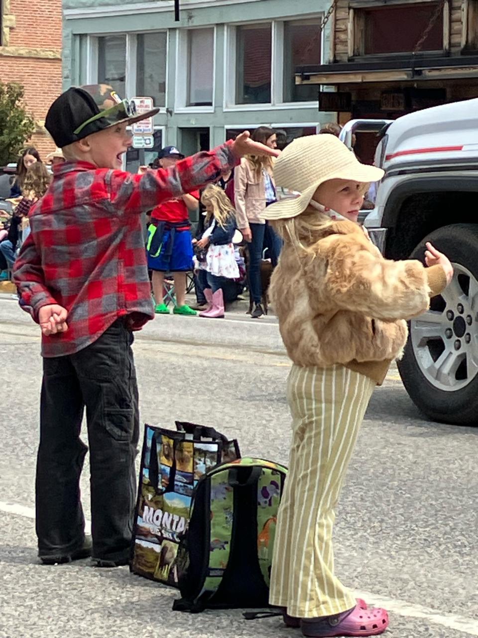 Children line up to catch candy thrown during the Fourth of July parade in Red Lodge, Montana, which dates back to 1929. Columnist Carrie Seidman is on a writer's retreat in Red Lodge.