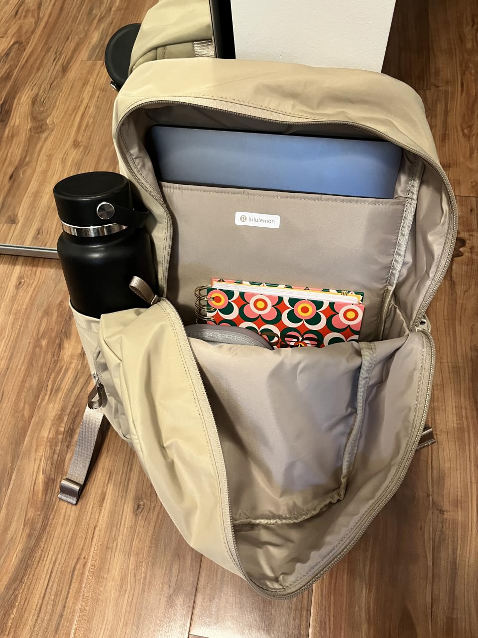 My Lululemon backpack filled with office essentials, plus plenty of room to spare. 