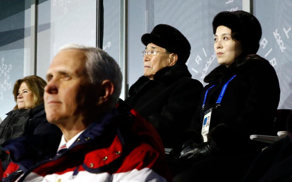 Kim Yo-jong alongside North Korea's nominal head of state Kim Yong Nam and behind Mike Pence as she watches the opening ceremony of the 2018 Winter Olympics in Pyeongchang, South Korea - AP