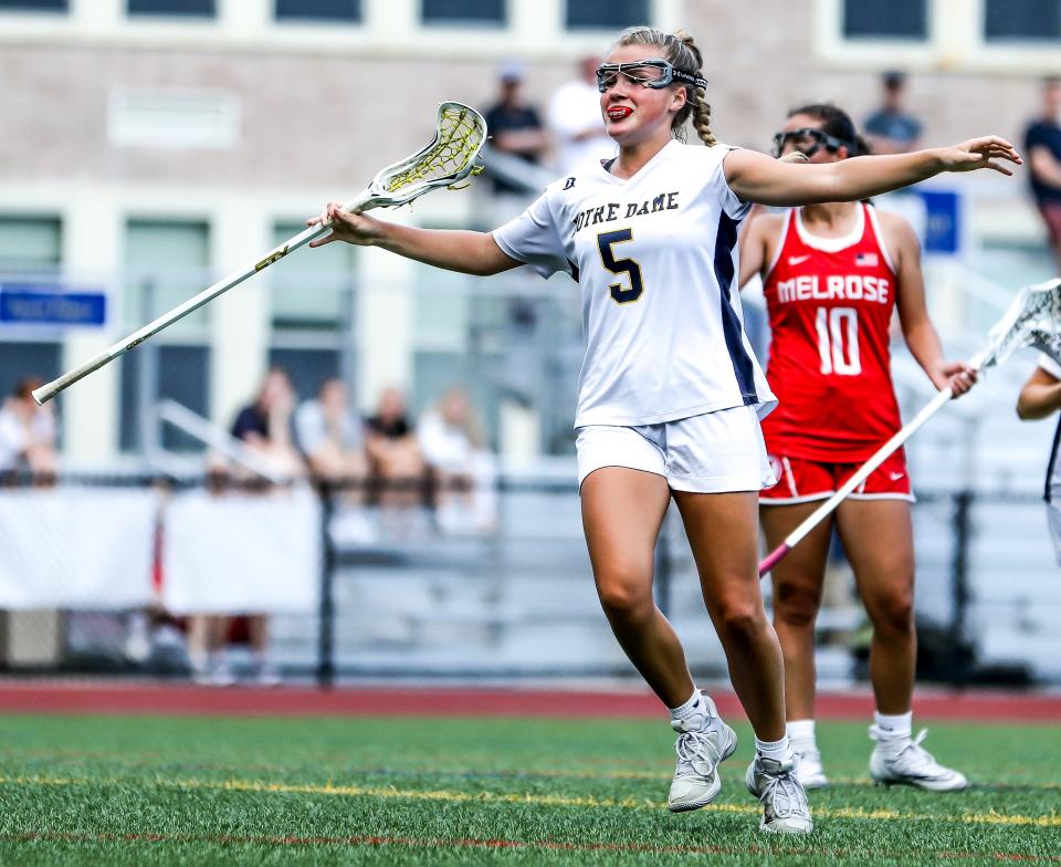 Notre Dame Academy's Alexa Kenney celebrates a goal during a game in the Division 2 state tournament against Melrose on Thursday, June 9, 2022.