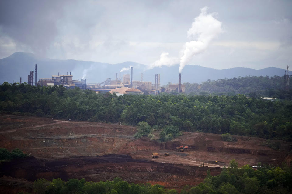 Steam rises from PT Vale Indonesia's nickel processing plant in Sorowako, South Sulawesi, Indonesia, Tuesday, Sept. 12, 2023. Demand for critical minerals like nickel and cobalt is surging as climate change hastens a transition to renewable energy, boosting carbon emissions by miners and processors of such materials. (AP Photo/Dita Alangkara)