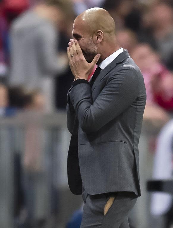 Pep Guardiola, with a ripped trouser leg, watches Bayern Munich enact a historic 6-1 drubbing of Porto