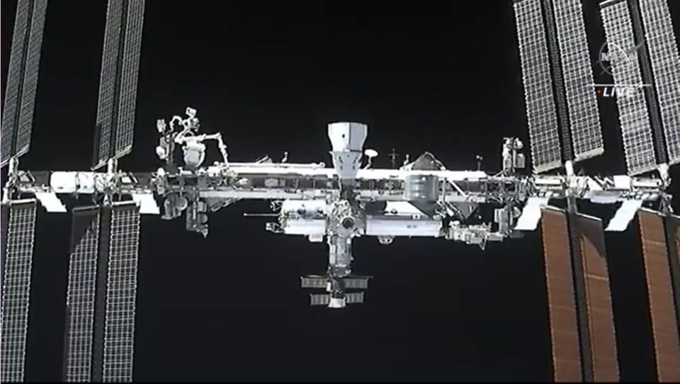 The International Space Station and SpaceX's Crew-1 Crew Dragon spacecraft Resilience (top) can be seen in this camera view from the Crew-2 Dragon Endeavour during docking operations on April 24, 2021.