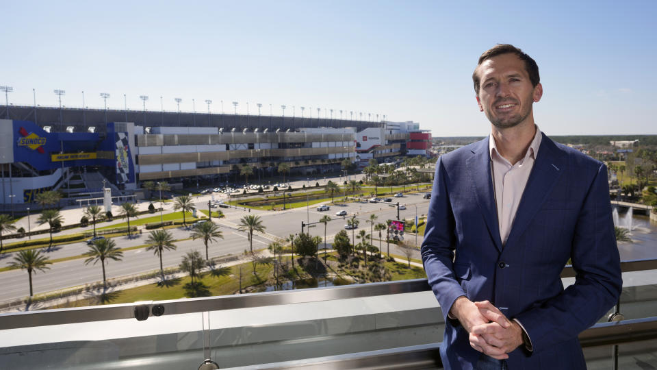 Ben Kennedy, NASCAR Senior Vice President of Racing Development and Strategy for NASCAR at his offices overlooking Daytona International Speedway, Friday, Jan. 27, 2023, in Daytona Beach, Fla. (AP Photo/John Raoux)