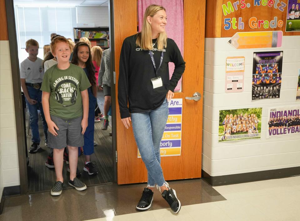 Ashley Joens, a student teacher and standout player on the Iowa State women's basketball team, waits for fifth grade students to line up for Physical Education at Irving Elementary School in Indianola on Aug. 18.