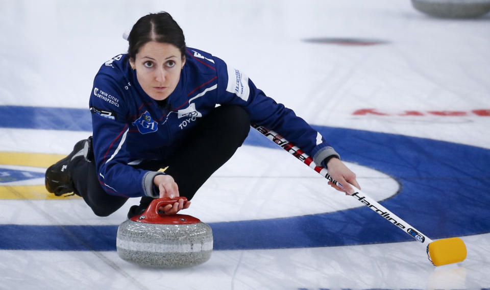 FILE - United States skip Tabitha Peterson makes a shot against Sweden in the bronze medal final at the women's world curling championship in Calgary, Alberta, Sunday, May 9, 2021. Tabitha Peterson is heading to her second straight Olympics — her first as the skip of the U.S. women’s team. (Jeff McIntosh/The Canadian Press via AP, File)