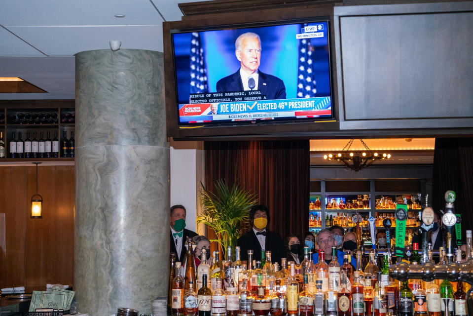 <strong>Washington, D.C., Nov. 7, 2020.</strong> People watch Biden’s first speech as President-elect at Joe's Seafood, Prime Steak & Stone Crab.<span class="copyright">Peter van Agtmael—Magnum Photos for TIME</span>