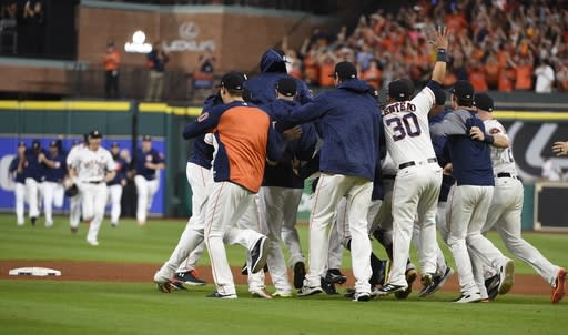 Astros fans are willing to pay serious amounts to see their team win its first World Series. (AP Photo/Eric Christian Smith)