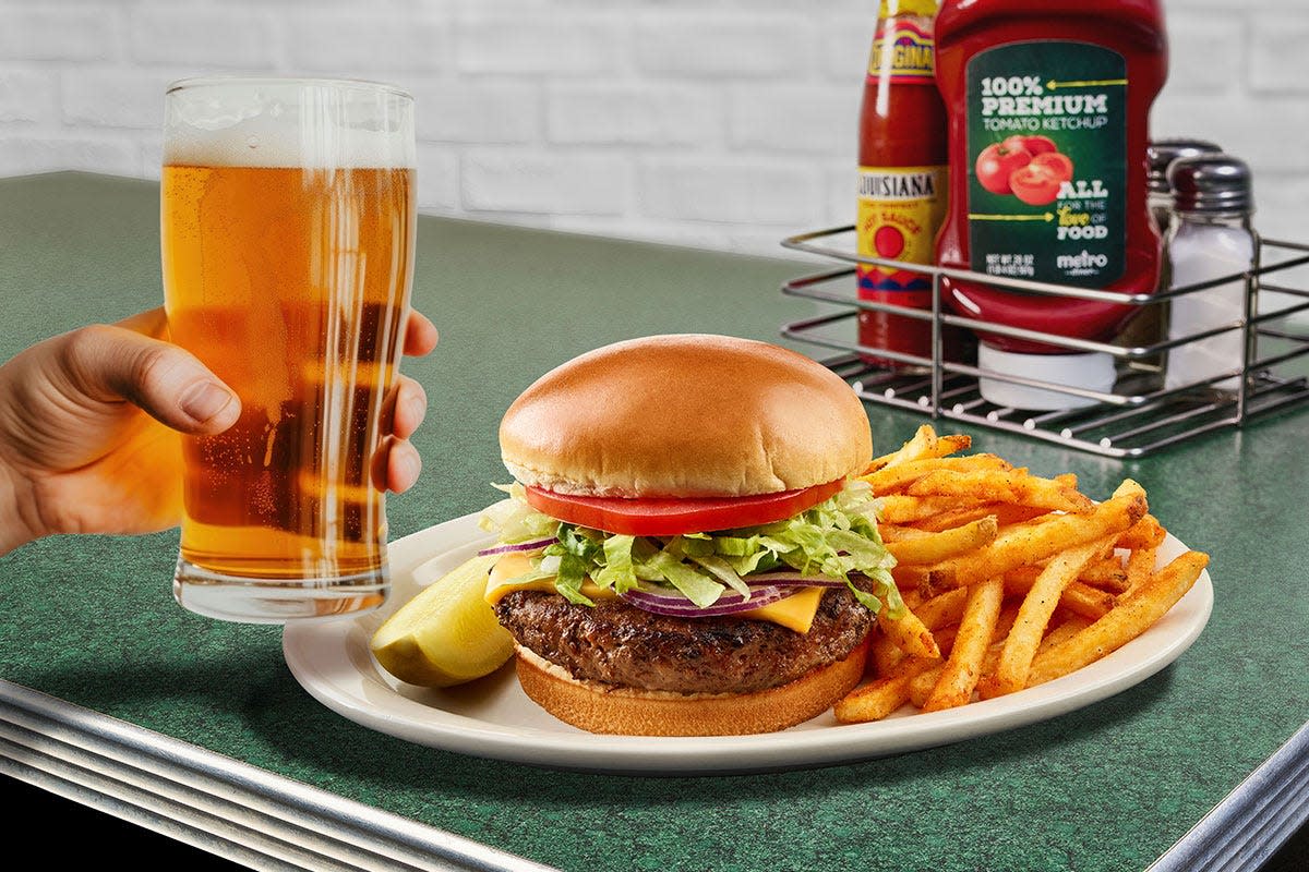 Metro Diner's menu match-ups pair a choice alcoholic beverage with one of the restaurants signature entrees. Shown is the classic burger and local beer.