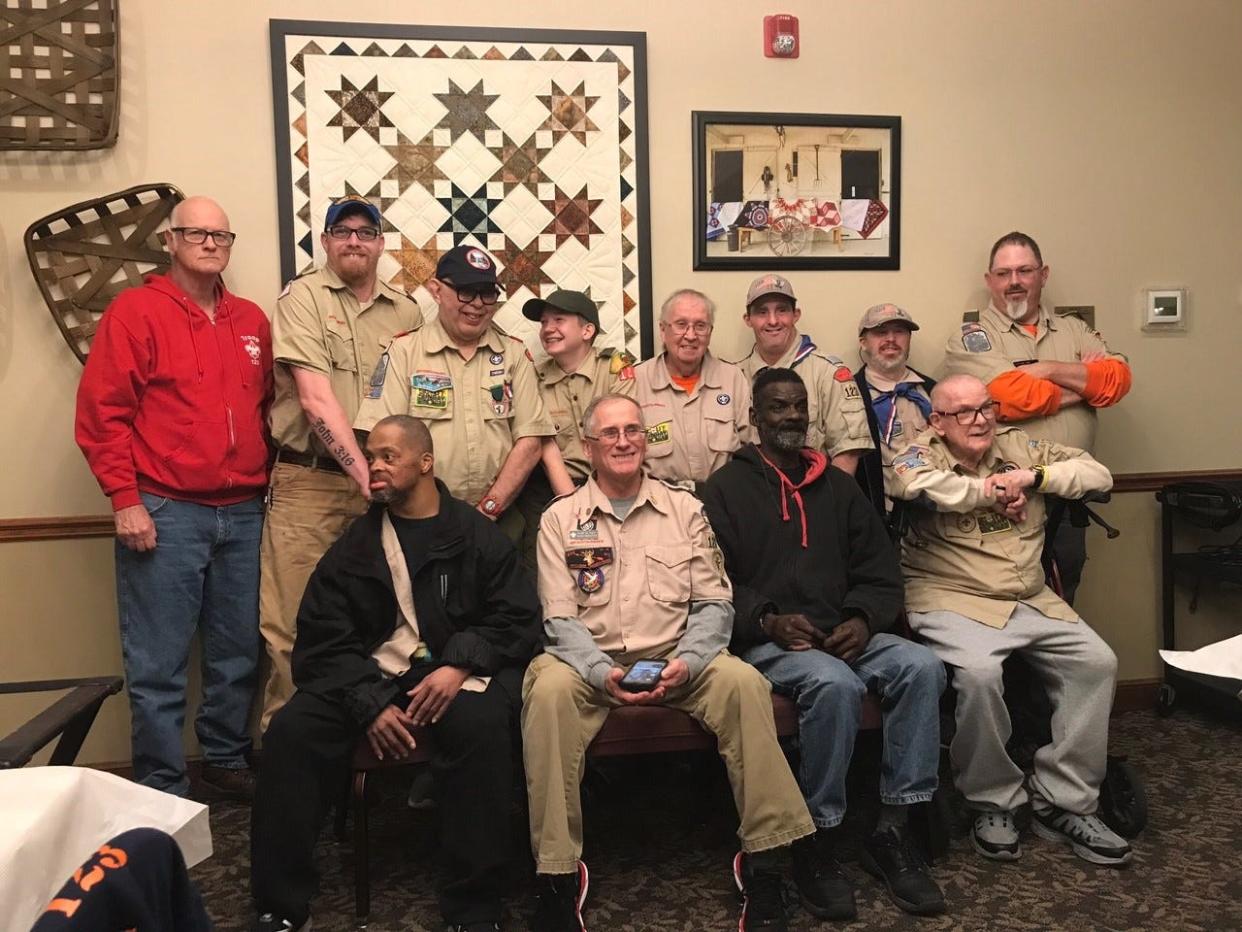 Boy Scout Troop 123 was founded by Bob Sliney, center, front row, in November of 1981. The troop members are individuals with developmental disabilities. Tuesday night. Scouts and assistant Scout leaders celebrated the troop's 40th anniversary with Sliney with a Thanksgiving meal at Der Dutchman in Bellville. Back row, left to right, Steve Swank, Chris Twitchell, Terry Weaver, Trey Riggle, Becky Bottorf, Rick Moloney, Tim Bottorf, Peter Lehman. Front row, left to right, Alvin Stevenson, Bob Sliney,  Ernie McFarland and Brent Abbott.