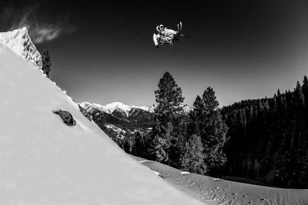 In the 1800s, the road below was the main highway that took miners over the pass toward their fortune. Could they have imagined the 2020s, with Collin Collins hucking himself in the other direction? Location: Sun Valley, Idaho.<p>Photo: Tal Roberts</p>