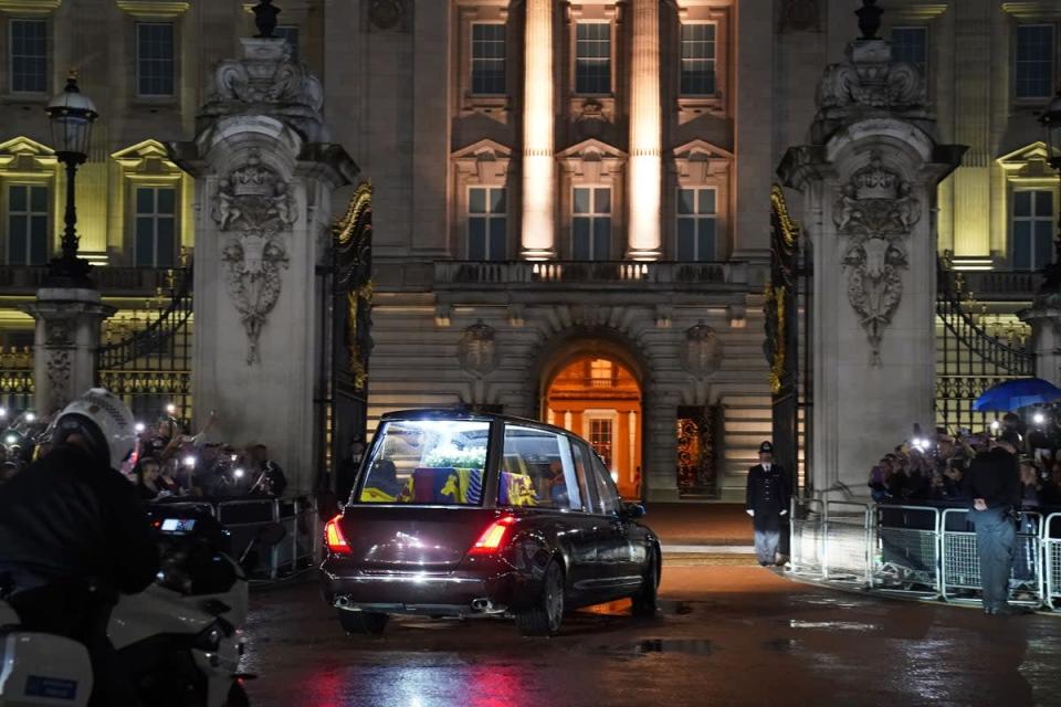 The hearse carrying the coffin of Queen Elizabeth II arrives at Buckingham Palace (PA) (PA Wire)