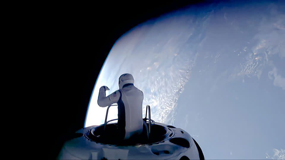 Polaris Dawn mission commander and Shift4 Payments CEO Jared Isaacman is seen anchored to a ladder dubbed the "skywalker" by SpaceX during his spacewalk. - SpaceX/Polaris Program