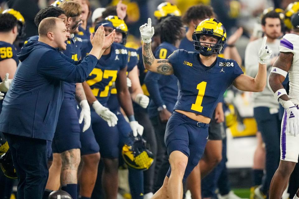 Michigan wide receiver Roman Wilson celebrates a play during the first quarter of the College Football Playoff national championship game against Washington at NRG Stadium in Houston, Texas on Monday, January 8, 2024.