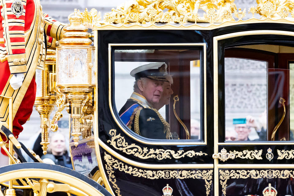 LONDON, UNITED KINGDOM - 2023/11/07: King Charles III travels along Whitehall in a carriage after the the State Opening of Parliament in London. King Charles III and anti monarchy protestors attend the State Opening of Parliament as King Charles III reads out the first King's Speech in over 70 years. (Photo by Tejas Sandhu/SOPA Images/LightRocket via Getty Images)