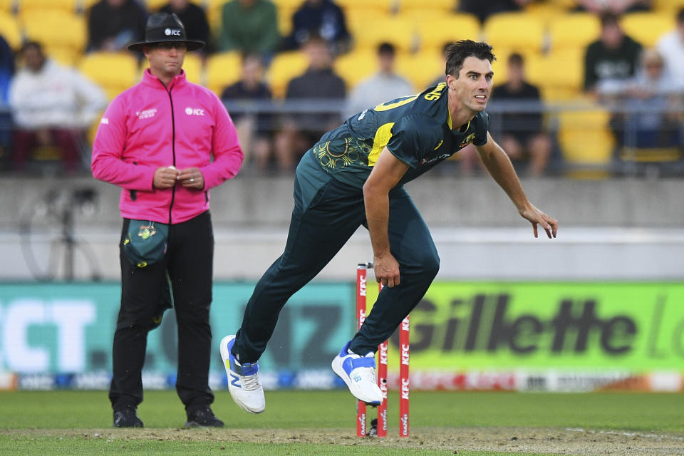 Australia's Pat Cummins bowls during the T20 cricket international between Australia and New Zealand in Wellington, New Zealand, Wednesday, Feb. 21, 2024. (Chris Symes/Photosport via AP)