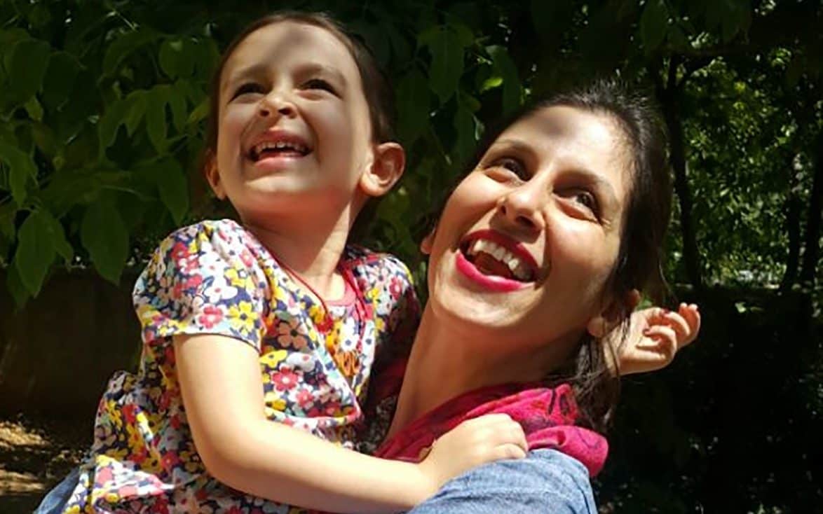 Nazanin Zaghari-Ratcliffe, seen here with her daughter Gabriella, has been held in Tehran since 2016 - AFP
