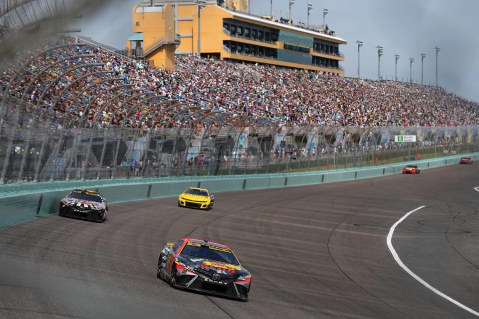 Oct 22, 2023; Homestead, Florida, USA; NASCAR Cup Series driver Martin Truex Jr (19) races during the 4EVER 400 presented by Mobil 1 at Homestead-Miami Speedway.