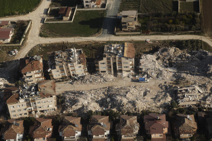 A general view of damage following a deadly earthquake, as U.S. Secretary of State Antony Blinken and Turkish Foreign Minister Mevlut Cavusoglu take a helicopter tour of earthquake stricken areas of Hatay Province, Turkey, Sunday, Feb. 19, 2023. (Clodagh Kilcoyne/Pool Photo via AP)