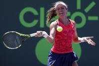 Mar 29, 2017; Miami, FL, USA; Johanna Konta of Great Britain hits a forehand against Simona Halep of Romania (not pictured) on day nine of the 2017 Miami Open at Crandon Park Tennis Center. Geoff Burke-USA TODAY Sports