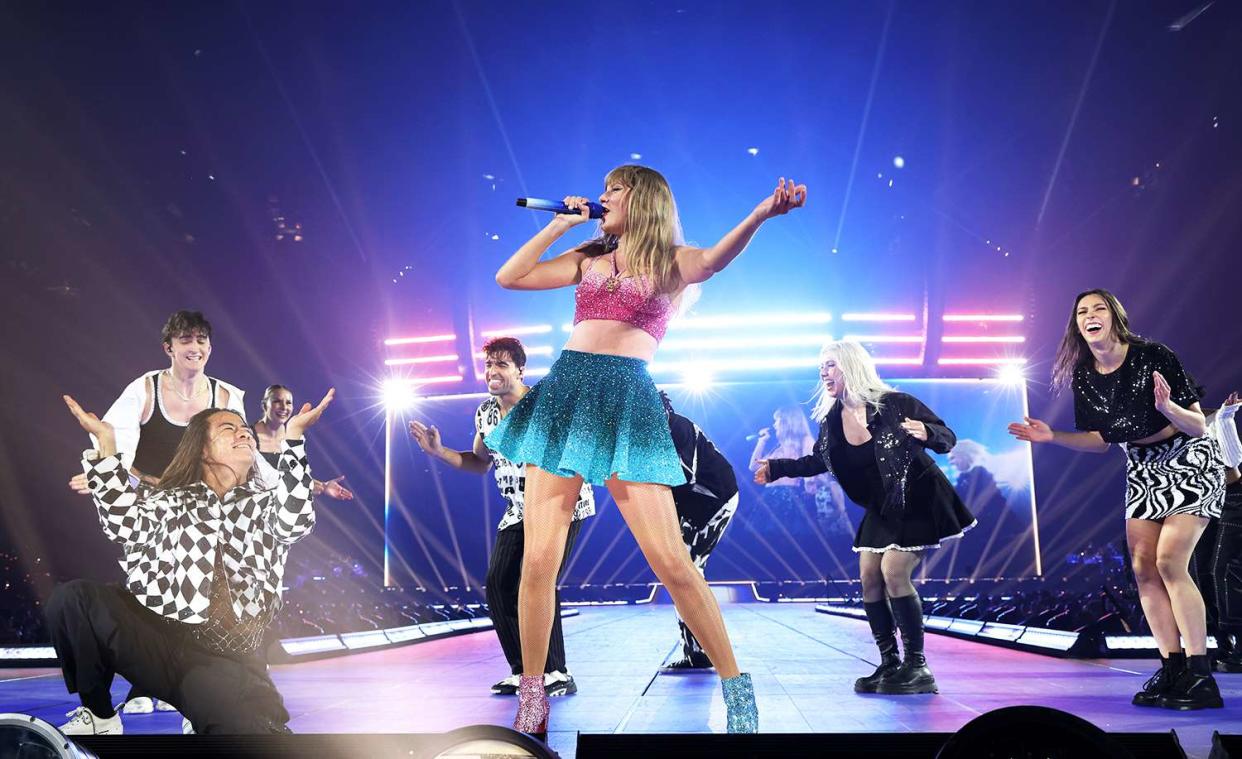 <p>Kevin Mazur/Getty</p> Taylor Swift wearing Roberto Cavalli at the Eras Tour