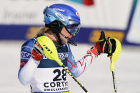 United States' Mikaela Shiffrin celebrates at the finish area of the slalom portion of the women's combined race, at the alpine ski World Championships, in Cortina d'Ampezzo, Italy, Monday, Feb. 15, 2021. (AP Photo/Giovanni Auletta)