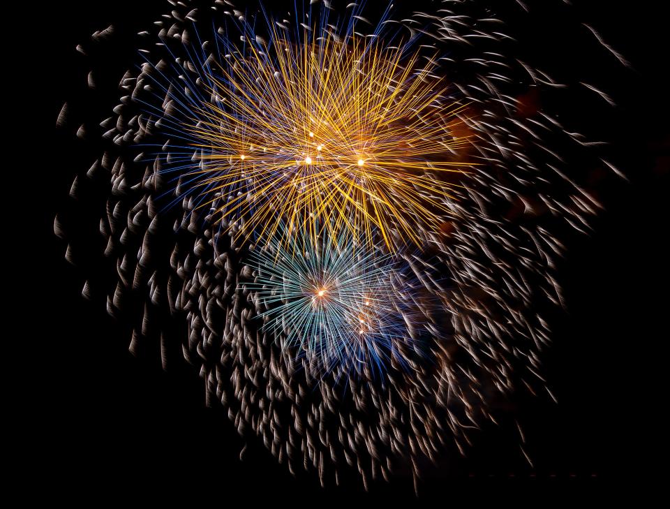 Fireworks exploded high in the air over the Bowman Field tarmac during the Thunder Over Louisville show Saturday evening. April 17, 2021