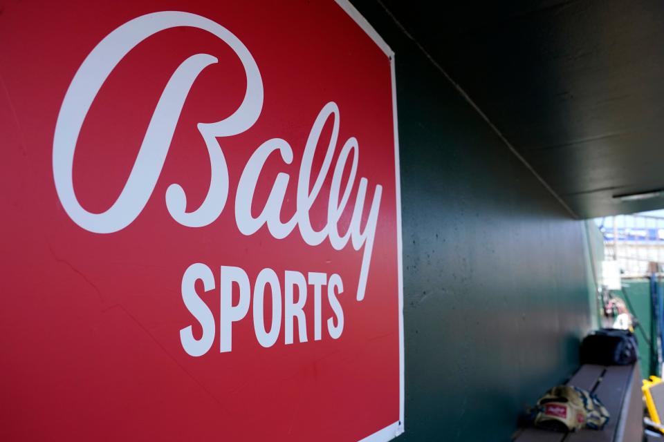 A Bally Sports logo  on a dugout wall. MLB will take over broadcasts of San Diego Padres games beginning Wednesday.