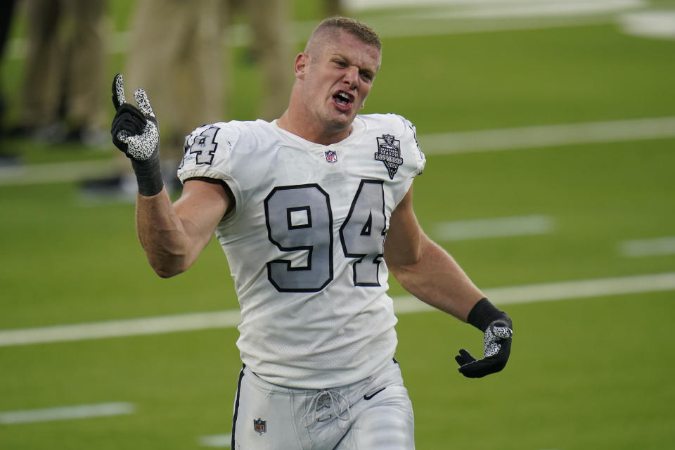 FILE - In this Nov. 8, 2020, file photo, Las Vegas Raiders defensive end Carl Nassib reacts after the Raiders defeated the Los Angeles Chargers in an NFL football game, in Inglewood, Calif. "To Carl Nassib and Kumi Yokoyama – two prominent, inspiring athletes who came out this week: I’m so proud of your courage. Because of you, countless kids around the world are seeing themselves in a new light today," U.S. President Joe Biden tweeted. Nassib is the first active NFL player to come out as gay. (AP Photo/Alex Gallardo, File)