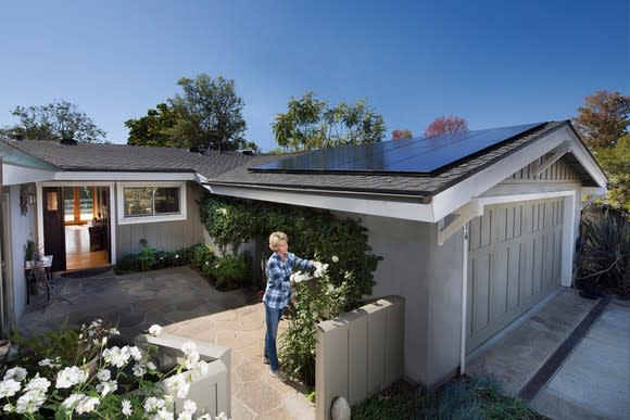 A rooftop solar installation with low profile solar panels.