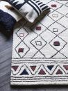 <p>Combining neutral tones within colourful geometric shapes, this Moroccan inspired rug will accentuate your décor.</p>