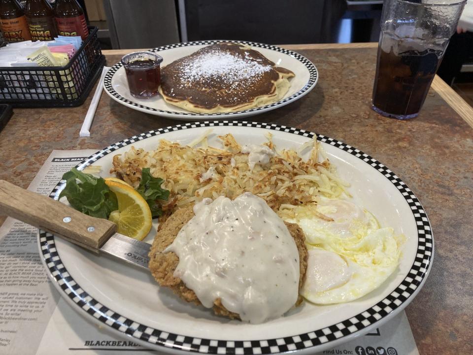Black Bear Diner has a tasty Bigfoot chicken fried steak and eggs breakfast ($15.99) with country gravy and served with hash browns and house made biscuits.