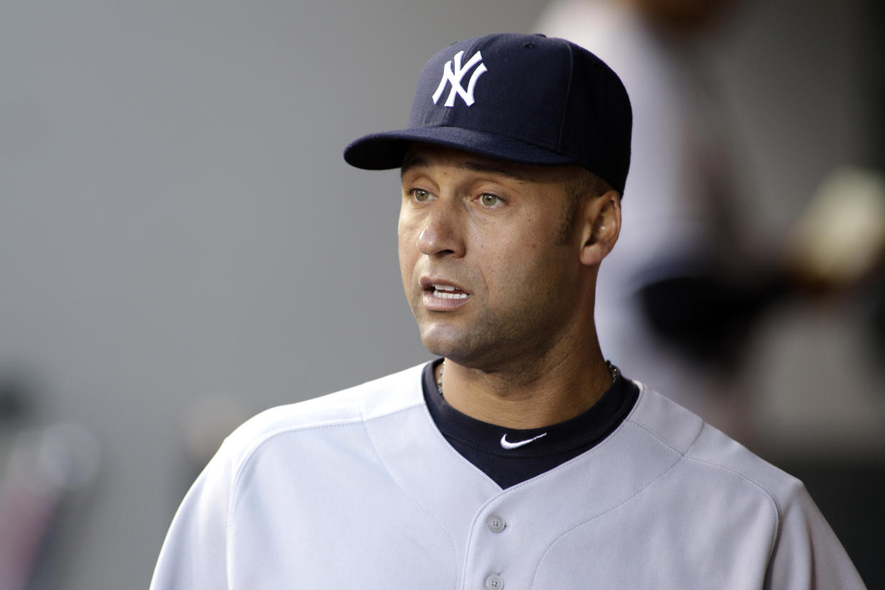 New York Yankees' Derek Jeter is shown in the dugout prior to a baseball game against the Seattle Mariners, Monday, Sept. 12, 2011, in Seattle. (AP Photo/Ted S. Warren)