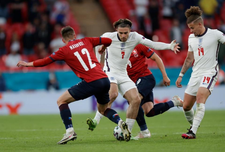 Czech players try to tackle Jack Grealish, who set up Raheem Sterling’s winner, as Kalvin Phillips looks to get involved.