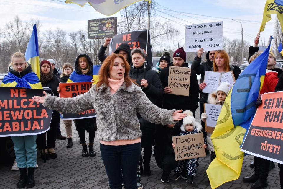 ZAPORIZHZHIA, UKRAINE - 2023/12/24: Protesters hold placards during the motor rally in support of Ukrainian prisoners of war under the slogan "Don't be silent! Captivity kills!" in Zaporizhzhia.