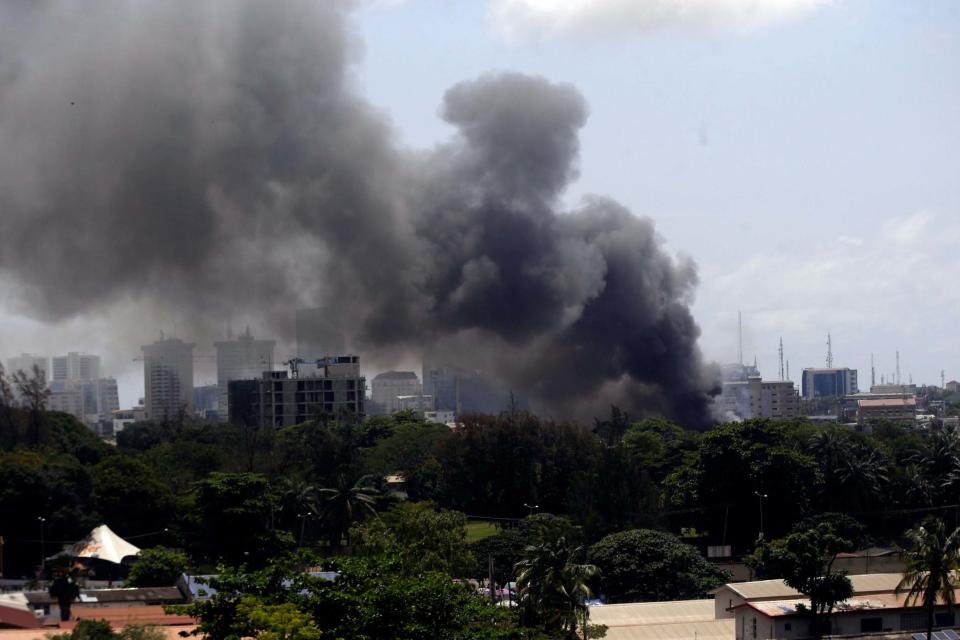 Smoke rises from the Nigeria Correctional service facility in Lagos, Nigeria on Thursday (AP)