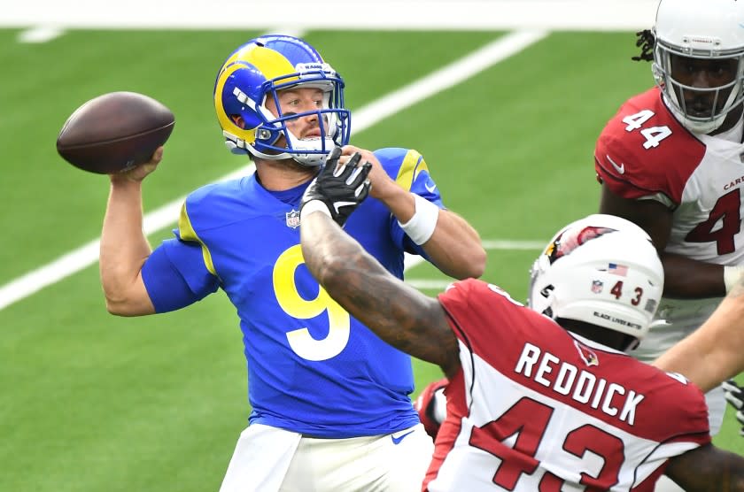 INGLEWOOD, CALIFORNIA JANUARY 3, 2021-Rams quarterback John Wolford throws a pass.