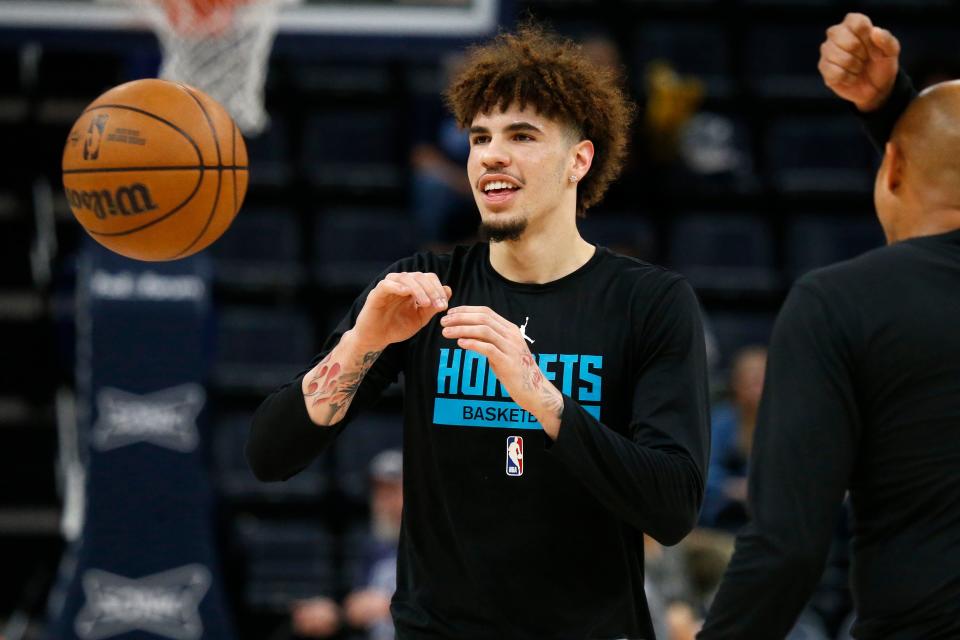 Nov 4, 2022; Memphis, Tennessee, USA; Charlotte Hornets guard LaMelo Ball (1) catches a pass during warm ups prior to the game against the Memphis Grizzlies at FedExForum. Mandatory Credit: Petre Thomas-USA TODAY Sports - 19358629