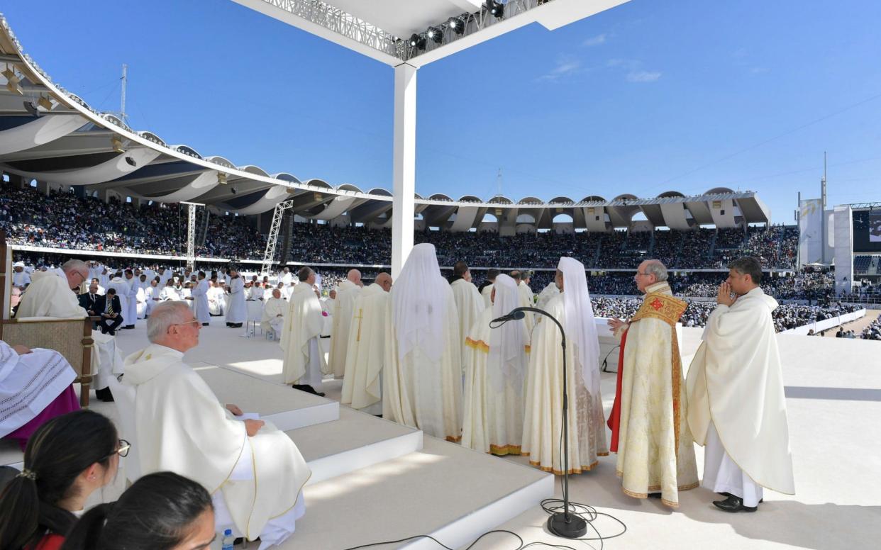 Pope Francis holds a mass at Zayed Sports City Stadium in Abu Dhabi - REUTERS