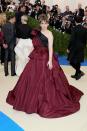 The Girls actress went for this out-there Elizabeth Kennedy deep burgundy ballgown, which she paired with a pair of military boots.