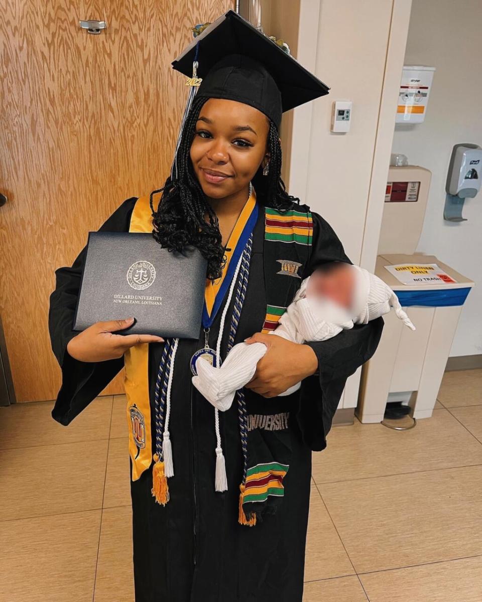 Jada Sayles with her degree and her newborn son. (Used with permission)