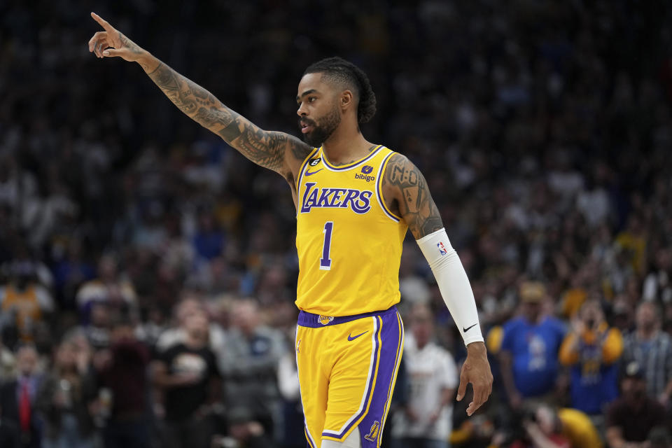 Los Angeles Lakers guard D'Angelo Russell (1) motions after a basket against the Denver Nuggets during the second half of Game 2 of the NBA basketball Western Conference Finals series, Thursday, May 18, 2023, in Denver. (AP Photo/Jack Dempsey)