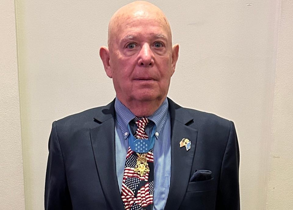 Gary Littrell, a Congressional Medal of Honor recipient, survived a four-day fight with enemy forces in April 1970 near the Cambodian border. Littrell spoke at a Veterans Day tribute at Valencia Shores, a retirement community west of Lake Worth Beach.