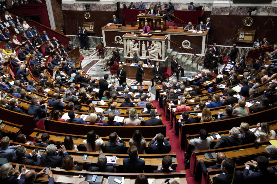 The National Assembly is pictured as French Prime Minister Elisabeth Borne delivers a speech in Paris, France, Wednesday, July 6, 2022. Borne lay out her main priorities at parliament after the government lost its straight majority in the National Assembly in elections last month. (AP Photo/Christophe Ena)