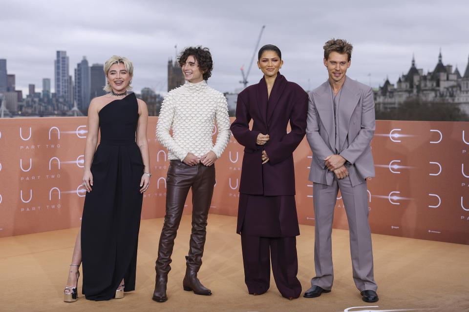 Florence Pugh, from left, Timothee Chalamet, Zendaya and Austin Butler pose for photographers at the photo call for the film 'Dune: Part Two' on Wednesday, Feb. 14, 2024 in London. (Vianney Le Caer/Invision/AP)