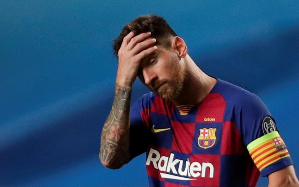  Barcelona's Lionel Messi looks dejected, as play resumes behind closed doors - Reuters