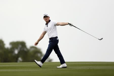 Bud Cauley reacts after a shot off the fairway of the 18th hole during the second round of the Valero Texas Open golf tournament at TPC San Antonio - AT&T Oaks Course. Mandatory Credit: Soobum Im-USA TODAY Sports