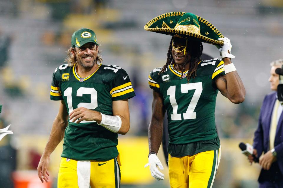 Green Bay Packers quarterback Aaron Rodgers (12) and wide receiver Davante Adams (17) following the game against the Detroit Lions at Lambeau Field in Green Bay, Wisconsin on Sept. 20, 2021.