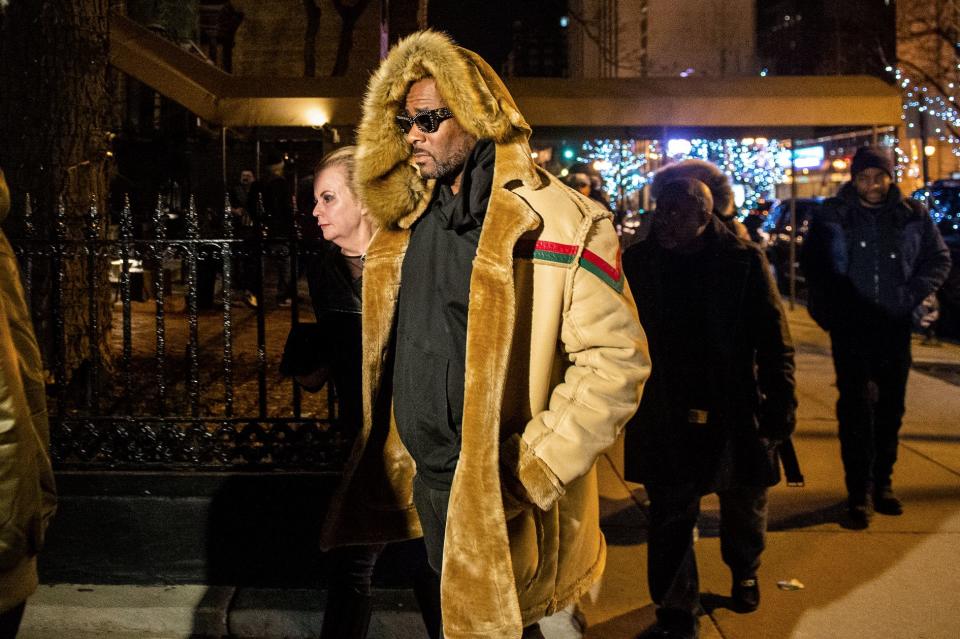 R. Kelly leaves a Chicago cigar lounge  after being released from jail Monday.