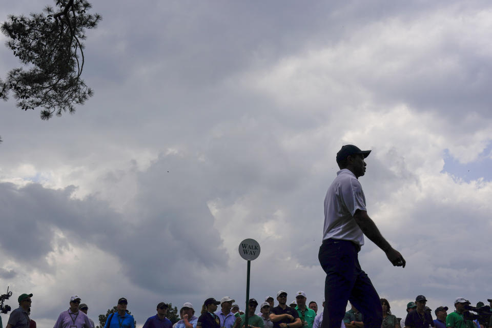 Tiger Woods walks off the tee on the 18th hole during the first round of the Masters golf tournament at Augusta National Golf Club on Thursday, April 6, 2023, in Augusta, Ga. (AP Photo/Charlie Riedel)